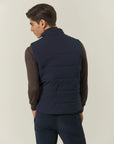 Navy blue quilted vest with buttons