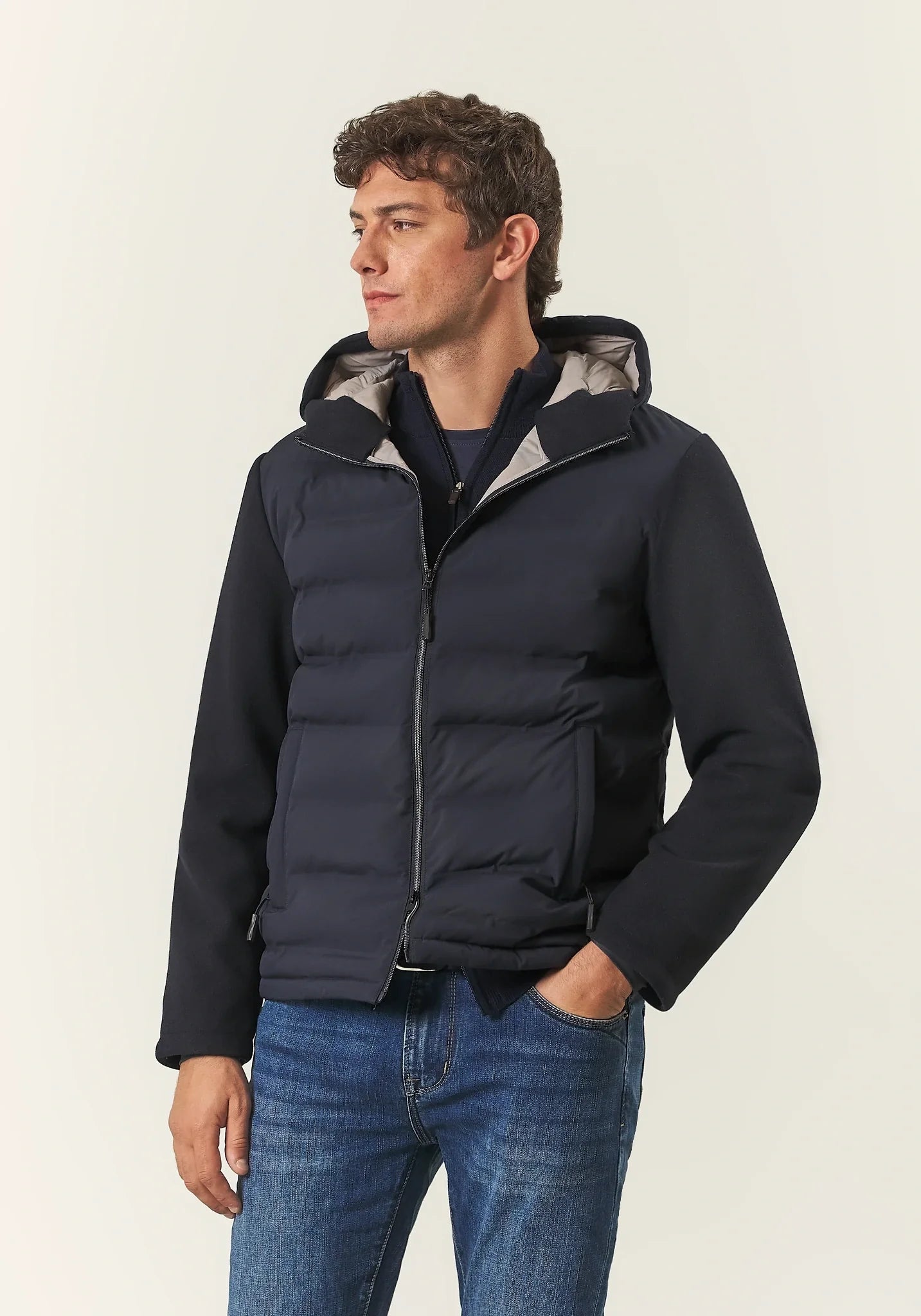 Blue quilted jacket with fabric sleeves