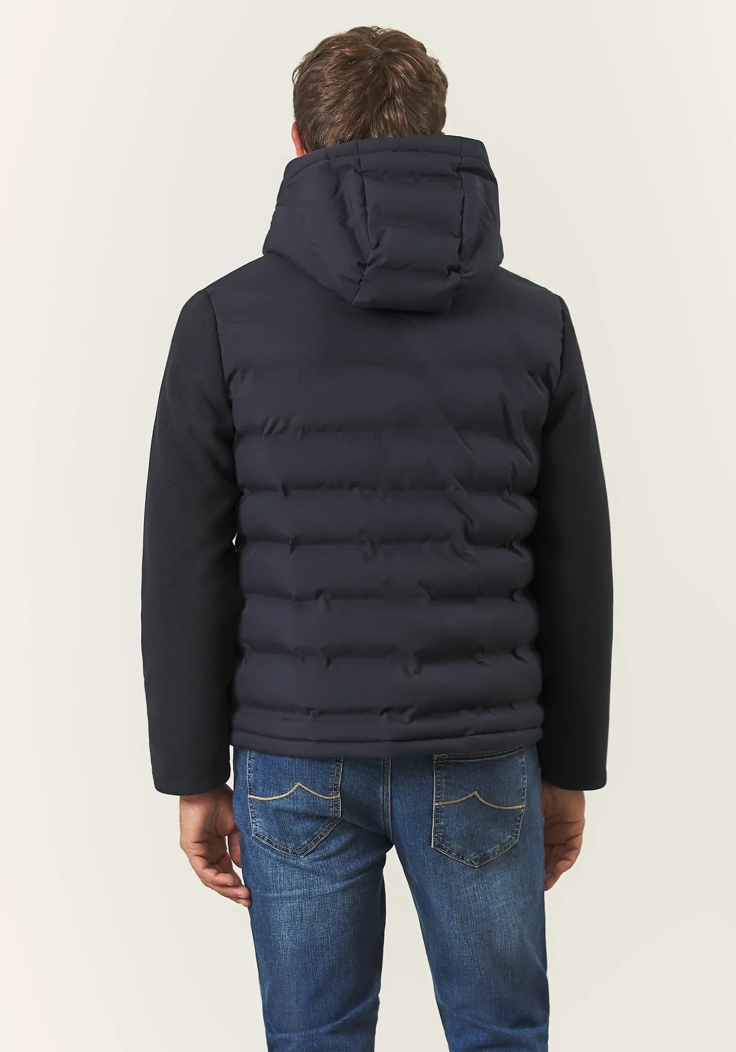 Blue quilted jacket with fabric sleeves