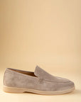 Beige suede slip-on loafers