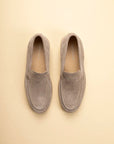 Beige suede slip-on loafers