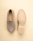 Beige suede slip-on loafers