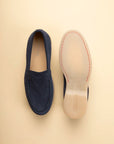 Blue suede slip-on loafers