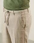 Beige linen trousers with drawstring