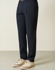 Blue trousers with half-elastic pleats