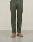 Sage green trousers with half-elastic pleats