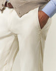 Cream trousers in slim-fit stretch cotton microstructure