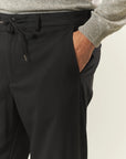 Black technical wool trousers with drawstring