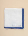 White clutch bag with blue linen edge