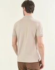 Beige polo shirt in slub cotton pique