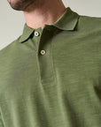 Green polo shirt in slub cotton pique