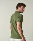 Green polo shirt in slub cotton pique