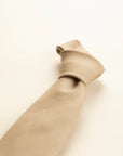 Plain beige wool tie