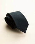 Plain navy blue wool tie