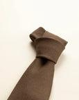Plain brown wool tie
